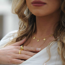 Load image into Gallery viewer, This sweet dainty coin necklace features seven charms on a 14.5 inch necklace that can be extended by an additional 1.5 inches. It is perfect for layering with a longer piece or worn on its own for a minimalist look. Length 14.5" + 1.5" extender (37+4 cm) 18k gold plated perfect choker for layering or alone water/tarnish resistant coin charm detail